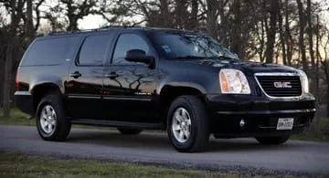 Black GMC Yukon luxury SUV for group transportation in Austin