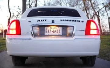 Just Married sign on a white wedding limousine in Austin